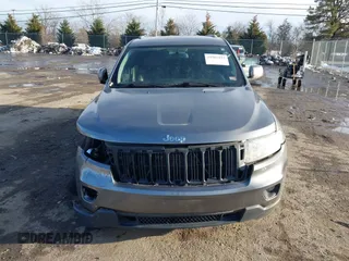 2011 Jeep Grand Cherokee 70th Anniversary with VIN 1J4RR4GT6BC715848, listed as a IAAI auction lot 41562152 with 119,910 mi miles. Bid and sale history available at carsss.com. Image 12.