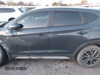 2019 Hyundai Tucson Sport with VIN KM8J33AL7KU901296, listed as a IAAI auction lot 41132884 with 76,948 mi miles. Bid and sale history available at carsss.com. Image 14.