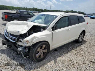 2013 Dodge Journey American Value with VIN 3C4PDCAB6DT730718, listed as a Copart auction lot 60970225 with 178,337 mi miles and Salvage title. Bid and sale history available at DreamBid. Image 1.
