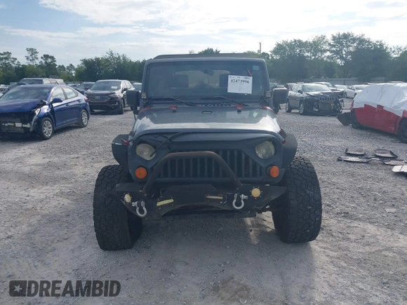 2007 Jeep Wrangler Unlimited Sahara with VIN 1J4GB59167L221686, listed as a IAAI auction lot 42473996 with 151,065 mi miles and . Bid and sale history available at DreamBid. Image 12.