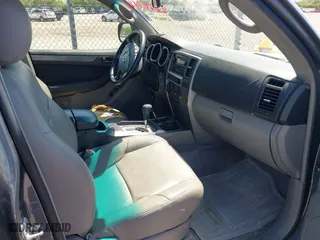 2004 Toyota 4Runner SR5 with VIN JTEZU14R840032318, listed as a IAAI auction lot 42006397 with 172,914 mi miles. Bid and sale history available at carsss.com. Image 5.