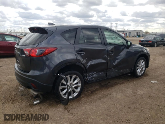 2015 Mazda CX-5 Grand Touring with VIN JM3KE4DY2F0526535, listed as a Copart auction lot 53046855 with 90,288 mi miles and Salvage Title. Bid and sale history available at DreamBid. Image 3.