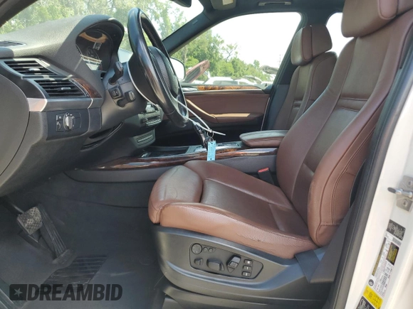 2012 BMW X5 35d with VIN 5UXZW0C57CL672443, listed as a Copart auction lot 55689215 with 247,014 mi miles and Clean title. Bid and sale history available at DreamBid. Image 7.