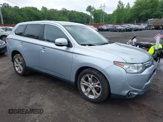 2014 Mitsubishi Outlander GT with VIN JA4JZ4AX3EZ013934, listed as a IAAI auction lot 42382774 with 66,829 mi miles and . Bid and sale history available at DreamBid. Image 18.