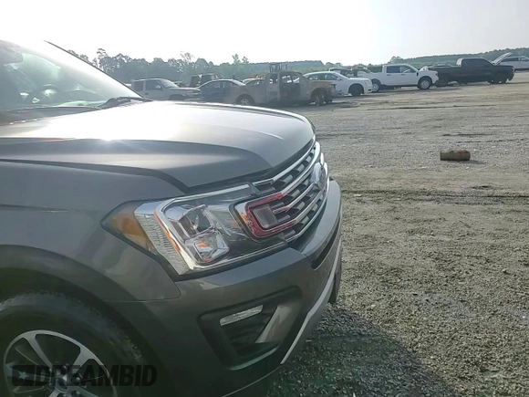 2018 Ford Expedition XLT with VIN 1FMJU1HT2JEA42800, listed as a Copart auction lot 56564745 with 53,878 mi miles and Salvage title. Bid and sale history available at DreamBid. Image 14.