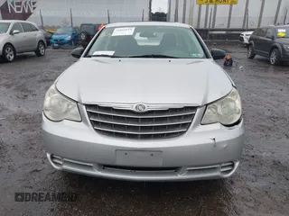 2010 Chrysler Sebring Touring z VIN 1C3CC4FB5AN128652, wystawiony jako IAAI lot #41863619 z przebiegiem 123 698 mil mil oraz . Historia ofert i sprzedaży dostępna na DreamBid. Obrazek 11.
