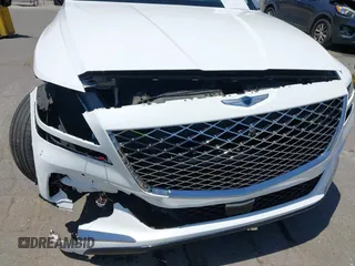 2023 Genesis GV80 with VIN KMUHBDSB8PU102875, listed as a IAAI auction lot 42370874 with 30,318 mi miles and . Bid and sale history available at DreamBid. Image 6.