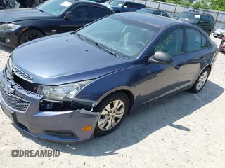 2014 Chevrolet Cruze LS with VIN 1G1PA5SG9E7287865, listed as a IAAI auction lot 42409343 with 155,882 mi miles and . Bid and sale history available at DreamBid. Image 2.