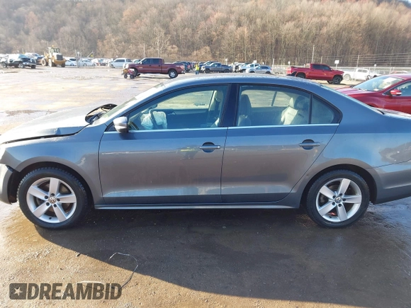 2014 Volkswagen Jetta TDI with VIN 3VWLL7AJ7EM276956, listed as a IAAI auction lot 41865670 with 135,159 mi miles and . Bid and sale history available at DreamBid. Image 14.