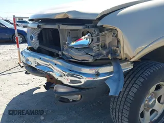 1999 Ford F-150 XL с VIN 1FTRX18L4XKB33057, выставлен на аукционе IAAI как лот 42227009 с пробегом Не указан миль и . История ставок и продаж доступна на DreamBid. Изображение 6.