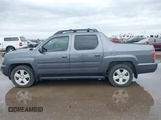 2014 Honda Ridgeline RTL with VIN 5FPYK1F50EB002577, listed as a IAAI auction lot 41931258 with 147,665 mi miles. Bid and sale history available at carsss.com. Image 14.