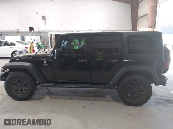 2017 Jeep Wrangler Unlimited Sport with VIN 1C4HJWDG2HL557576, listed as a IAAI auction lot 42712859 with 86,280 mi miles and . Bid and sale history available at DreamBid. Image 14.