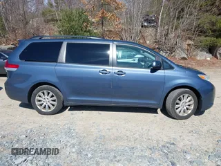 2014 Toyota Sienna LE with VIN 5TDJK3DC4ES087457, listed as a IAAI auction lot 41773128 with 103,993 mi miles and . Bid and sale history available at DreamBid. Image 13.