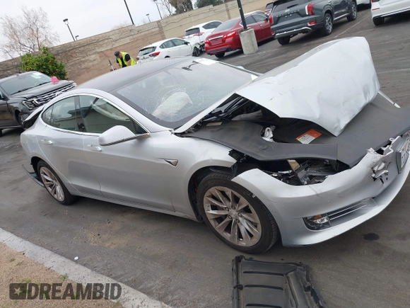 2017 Tesla Model S 60 with VIN 5YJSA1E17HF189627, listed as a IAAI auction lot 41891766 with 106,003 mi miles and . Bid and sale history available at DreamBid. Image 14.