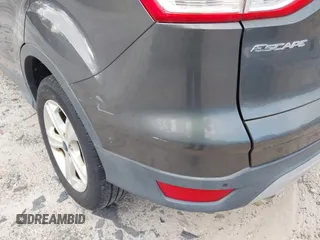 2016 Ford Escape SE with VIN 1FMCU0GX3GUC05279, listed as a IAAI auction lot 42142557 with 87,177 mi miles. Bid and sale history available at carsss.com. Image 12.