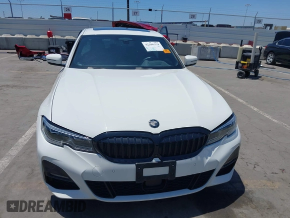 2019 BMW 3 Series 330i with VIN WBA5R1C55KAJ98934, listed as a IAAI auction lot 42396379 with 65,946 mi miles and . Bid and sale history available at DreamBid. Image 12.