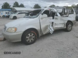 2003 Kia Sedona LX with VIN KNDUP131836430383, listed as a Copart auction lot 79829254 with 198,896 mi miles and Salvage Title. Bid and sale history available at carsss.com. Image 1.