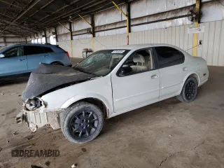 2001 Nissan Maxima GXE z VIN JN1CA31D41T809212, wystawiony jako Copart lot #57845405 z przebiegiem 244 502 mil mil oraz Szkoda całkowita • Salvage title. Historia ofert i sprzedaży dostępna na DreamBid. Obrazek 1.