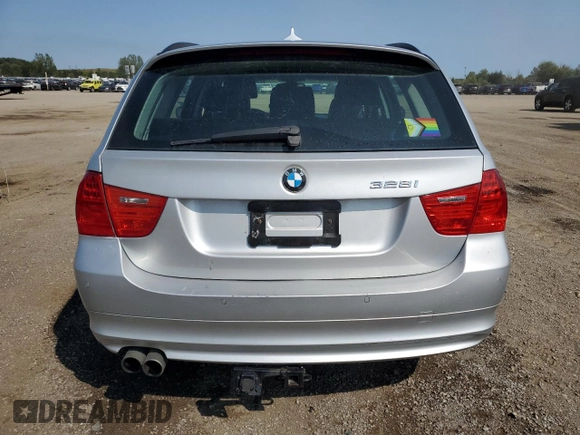 2011 BMW 3 Series 328i xDrive with VIN WBAUU3C55BA542400, listed as a Copart auction lot 70725714 with 122,510 mi miles and Clean Title. Bid and sale history available at DreamBid. Image 6.