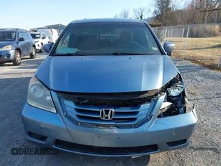 2010 Honda Odyssey EX z VIN 5FNRL3H46AB059211, wystawiony jako IAAI lot #41504573 z przebiegiem 217 415 mil mil oraz . Historia ofert i sprzedaży dostępna na DreamBid. Obrazek 13.