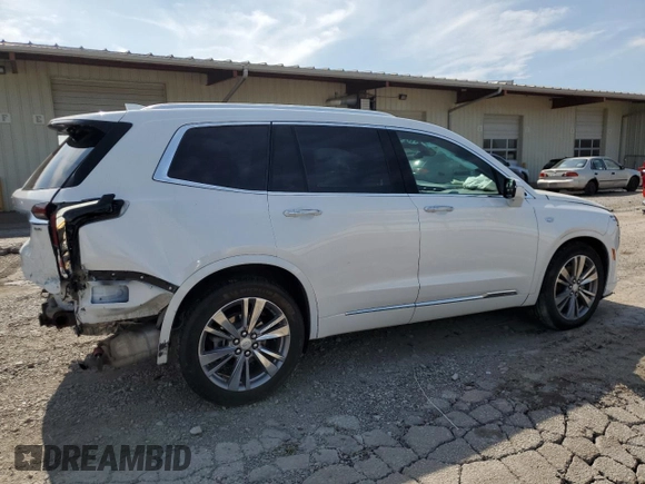 2022 Cadillac XT6 Premium Luxury with VIN 1GYKPDRS7NZ114056, listed as a Copart auction lot 66507104 with 21,989 mi miles and Clean Title. Bid and sale history available at carsss.com. Image 3.