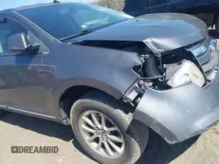 2010 Ford Edge SEL with VIN 2FMDK3JC0ABA36885, listed as a IAAI auction lot 41869192 with 187,549 mi miles. Bid and sale history available at carsss.com. Image 13.