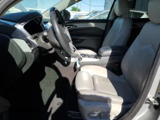 2014 Cadillac SRX Luxury Collection with VIN 3GYFNBE30ES596974, listed as a Copart auction lot 53278375 with 61,452 mi miles and Salvage Title. Bid and sale history available at DreamBid. Image 7.