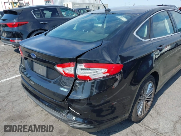 2015 Ford Fusion SE with VIN 3FA6P0HDXFR195603, listed as a IAAI auction lot 42761373 with 105,719 mi miles and . Bid and sale history available at DreamBid. Image 6.