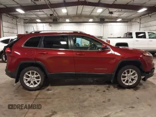 2016 Jeep Cherokee Latitude with VIN 1C4PJMCS2GW131065, listed as a IAAI auction lot 42296276 with 145,587 mi miles and . Bid and sale history available at DreamBid. Image 14.