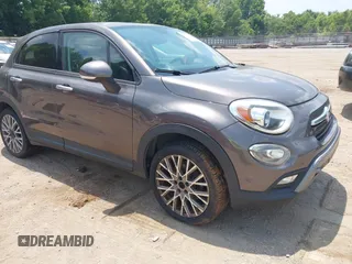 2016 FIAT 500X Trekking with VIN ZFBCFXCT5GP353011, listed as a IAAI auction lot 42577252 with Not provided miles and . Bid and sale history available at DreamBid. Image 1.