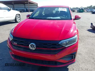 2019 Volkswagen Jetta GLI S z VIN 3VW5T7BU3KM225015, wystawiony jako IAAI lot #41352228 z przebiegiem 96 874 mil mil oraz . Historia ofert i sprzedaży dostępna na DreamBid. Obrazek 12.