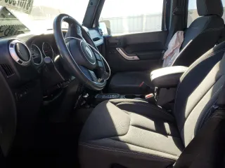 2013 Jeep Wrangler Unlimited Rubicon 10th Anniversary с VIN 1C4HJWFG7DL559539, выставлен на аукционе Copart как лот 81675894 с пробегом 99 425 миль миль и Списание • Salvage title. История ставок и продаж доступна на DreamBid. Изображение 7.