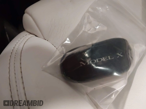 2016 Tesla Model X 70D with VIN 5YJXCBE27GF004974, listed as a IAAI auction lot 41630556 with 167,709 mi miles. Bid and sale history available at carsss.com. Image 11.