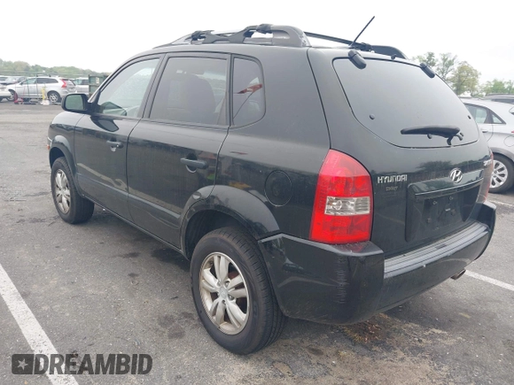 2009 Hyundai Tucson GLS with VIN KM8JM12B59U990027, listed as a IAAI auction lot 42195935 with 170,875 mi miles. Bid and sale history available at carsss.com. Image 3.