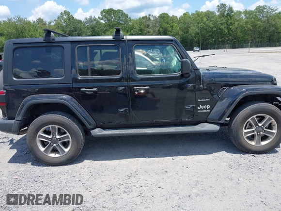 2021 Jeep Wrangler Unlimited Sahara with VIN 1C4HJXEN9MW681422, listed as a IAAI auction lot 42563426 with 48,582 mi miles and . Bid and sale history available at DreamBid. Image 13.