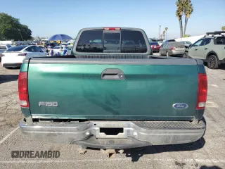 1999 Ford F-150 XL with VIN 1FTRX17L8XKB06509, listed as a Copart auction lot 49062185 with 110,582 mi miles and Salvage Title. Bid and sale history available at carsss.com. Image 6.