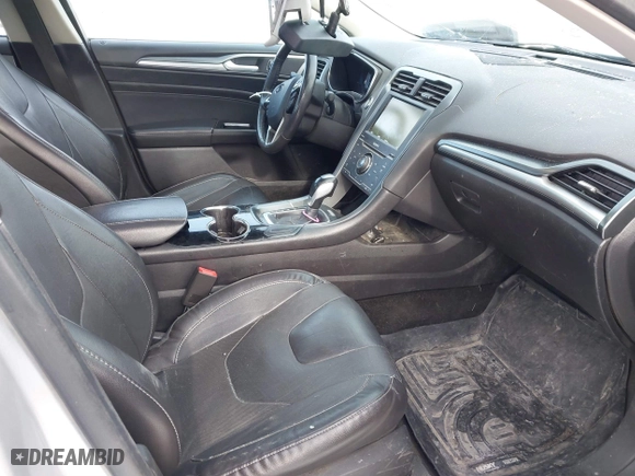 2014 Ford Fusion Titanium Hybrid with VIN 3FA6P0RU1ER291455, listed as a IAAI auction lot 41821152 with 108,408 mi miles. Bid and sale history available at carsss.com. Image 5.