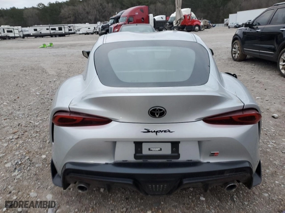 2022 Toyota GR Supra 2.0 with VIN WZ1DB2C09NW048380, listed as a Copart auction lot 87413024 with 0 mi miles and Salvage Title. Bid and sale history available at carsss.com. Image 6.