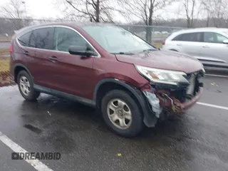 2015 Honda CR-V LX with VIN 2HKRM4H37FH695347, listed as a IAAI auction lot 41124018 with 117,400 mi miles and . Bid and sale history available at carsss.com. Image 1.