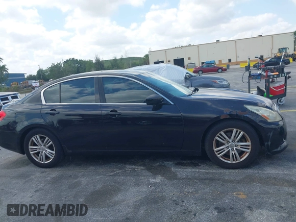 2013 Infiniti G37 Sedan Journey with VIN JN1CV6AP9DM711338, listed as a IAAI auction lot 42113221 with 153,049 mi miles. Bid and sale history available at carsss.com. Image 14.