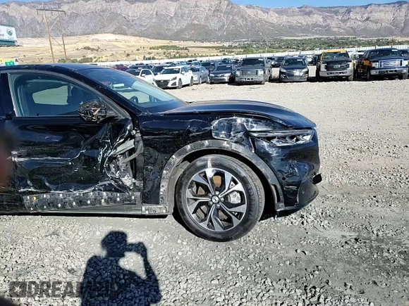 2021 Ford Mustang Mach-E Premium with VIN 3FMTK3SS5MMA01294, listed as a Copart auction lot 77201384 with 42,896 mi miles and Salvage Title. Bid and sale history available at DreamBid. Image 11.