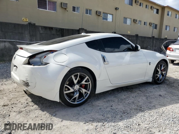 2014 Nissan 370Z Touring with VIN JN1AZ4EH6EM630690, listed as a Copart auction lot 43939795 with 66,797 mi miles and Salvage Title. Bid and sale history available at carsss.com. Image 3.