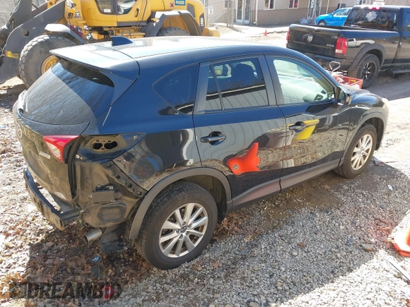 2014 Mazda CX-5 Touring with VIN JM3KE4CY8E0333029, listed as a IAAI auction lot 41857199 with 218,887 mi miles. Bid and sale history available at carsss.com. Image 4.