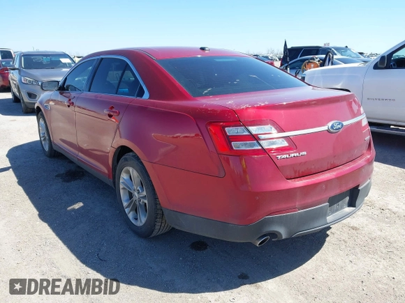 2013 Ford Taurus SEL with VIN 1FAHP2E8XDG231807, listed as a IAAI auction lot 41774166 with 120,639 mi miles and . Bid and sale history available at carsss.com. Image 3.