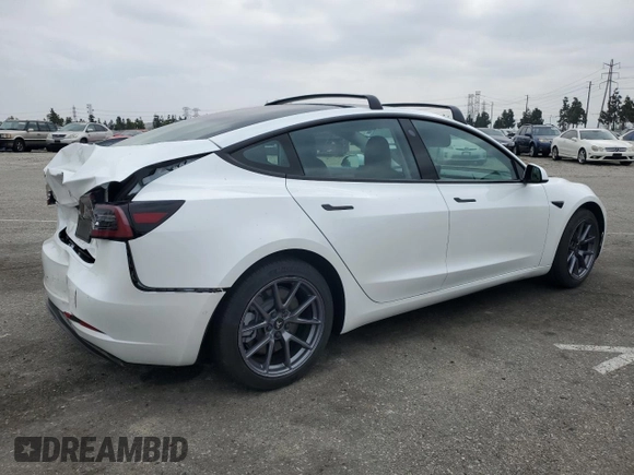 2021 Tesla Model 3 Standard Range Plus with VIN 5YJ3E1EA7MF087909, listed as a Copart auction lot 50942395 with 16,591 mi miles and Salvage Title. Bid and sale history available at carsss.com. Image 3.