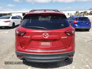 2016 Mazda CX-5 Grand Touring with VIN JM3KE2DY5G0692554, listed as a Copart auction lot 51322475 with 128,086 mi miles and Salvage Title. Bid and sale history available at carsss.com. Image 6.