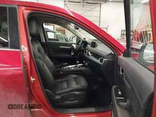 2018 Mazda CX-5 Grand Touring with VIN JM3KFBDM5J0414013, listed as a IAAI auction lot 42013479 with 88,225 mi miles and . Bid and sale history available at DreamBid. Image 5.
