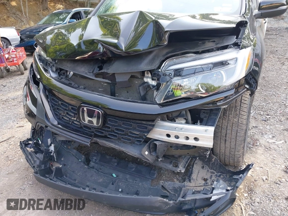 2021 Honda Passport EX-L с VIN 5FNYF8H57MB022083, выставлен на аукционе IAAI как лот 42399294 с пробегом 61 014 миль миль и . История ставок и продаж доступна на DreamBid. Изображение 6.