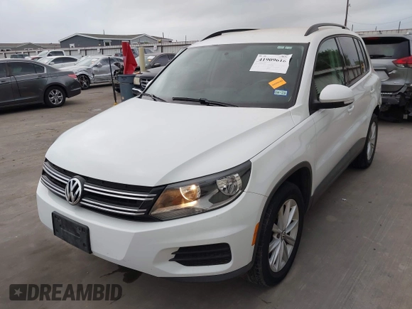 2015 Volkswagen Tiguan R-Line with VIN WVGAV7AX5FW585248, listed as a IAAI auction lot 41909618 with 137,448 mi miles and . Bid and sale history available at DreamBid. Image 2.