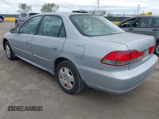 2001 Honda Accord EX z VIN 1HGCG16571A010751, wystawiony jako IAAI lot #42074284 z przebiegiem 281 526 mil mil oraz . Historia ofert i sprzedaży dostępna na DreamBid. Obrazek 3.